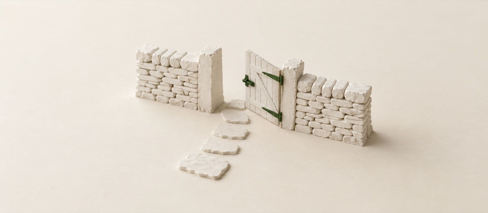 A cream study model of a low stone wall with a single wooden gate standing open in it, a path of small flat stepping stones leading through the gate, with the gate latch and its hinge straps in green.